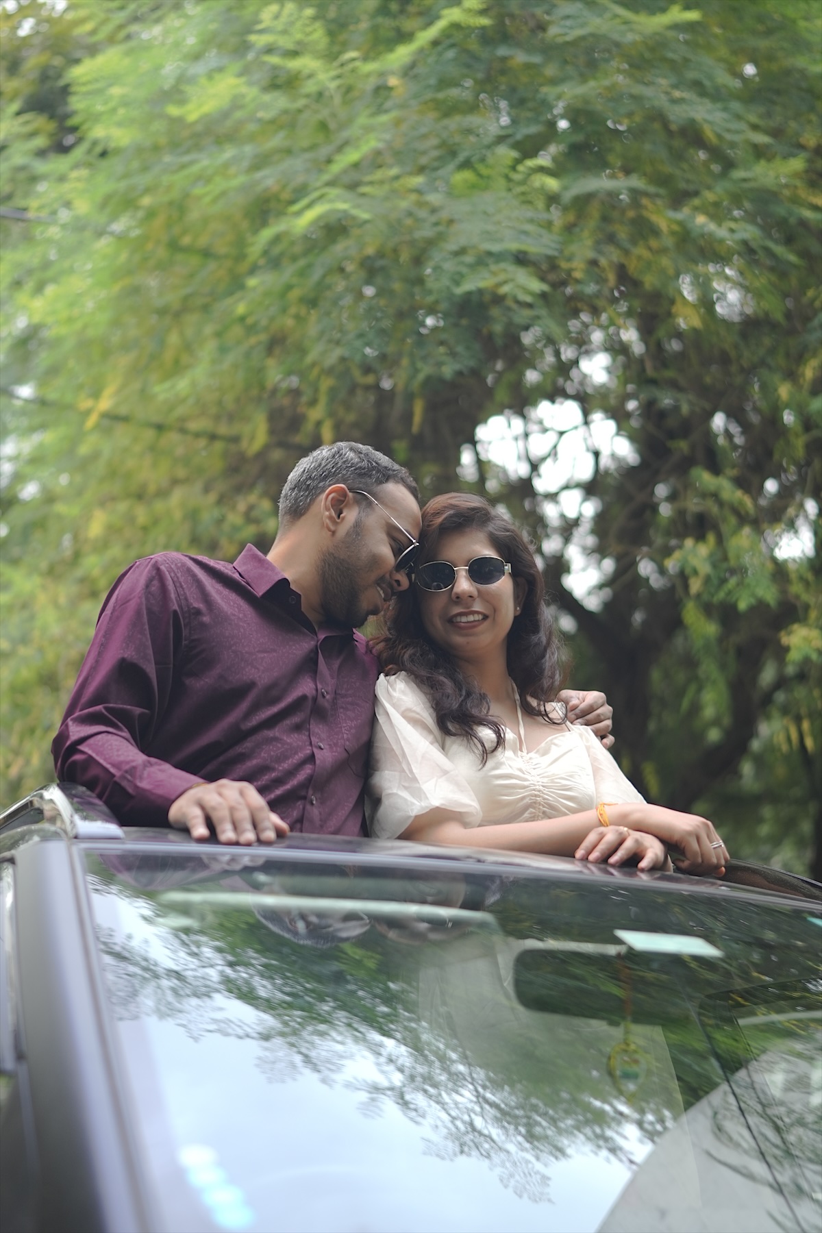 Sunglasses on, out of the sunroof